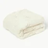 Flauschige Kuscheldecke Nari mit winterlichem Motiv
