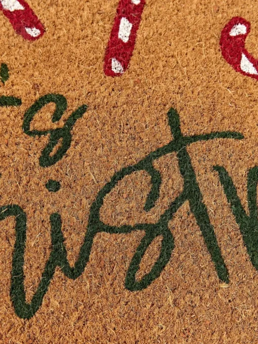 Handgetuftete Fußmatte Anuka mit Weihnachtsmuster