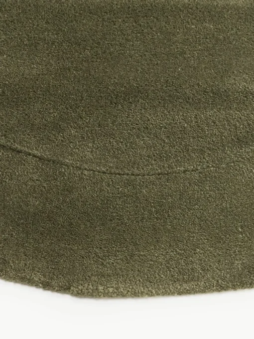 Handgetufteter Wollteppich Kadey in organischer Form