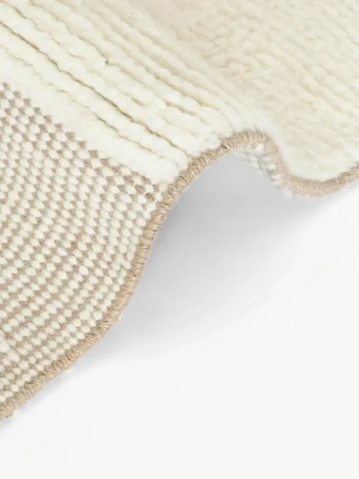 Handgewebter Teppich Laine mit Hoch-Tief-Muster und Fransen