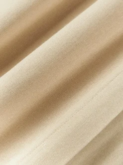 Kissenhülle Whatever mit bestickter Aufschrift
