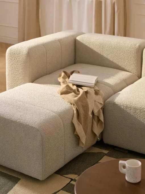 Modulares Bouclé-Sofa Lena (4-Sitzer) mit Hocker (links/rechts)
