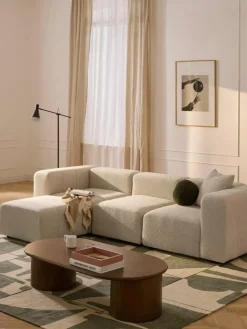 Modulares Bouclé-Sofa Lena (4-Sitzer) mit Hocker (links/rechts)