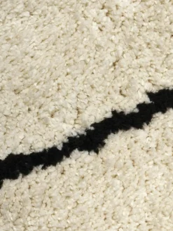 Runder flauschiger Hochflor-Teppich Naima, handgetuftet