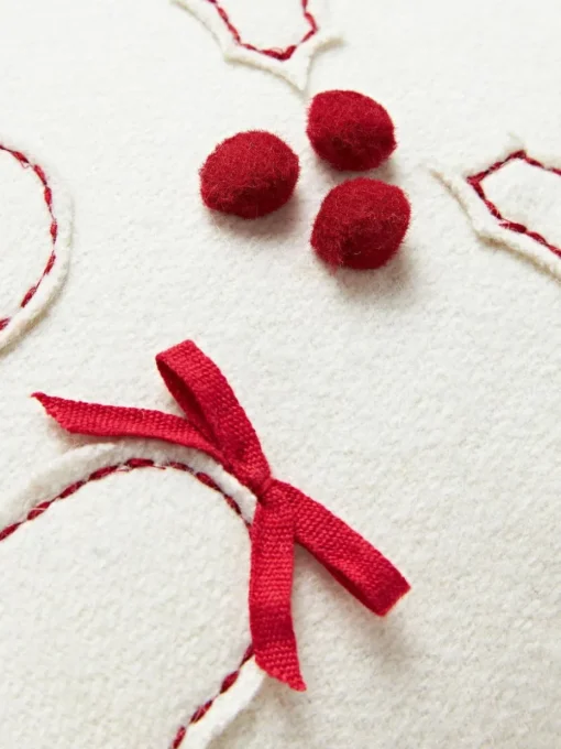Woll-Dekokissen Jova mit winterlichem Motiv