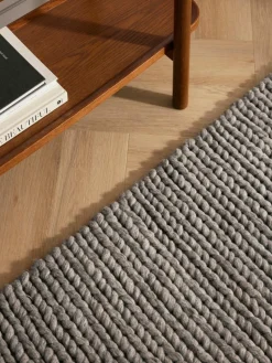 Wollteppich Bruna mit geflochtener Struktur